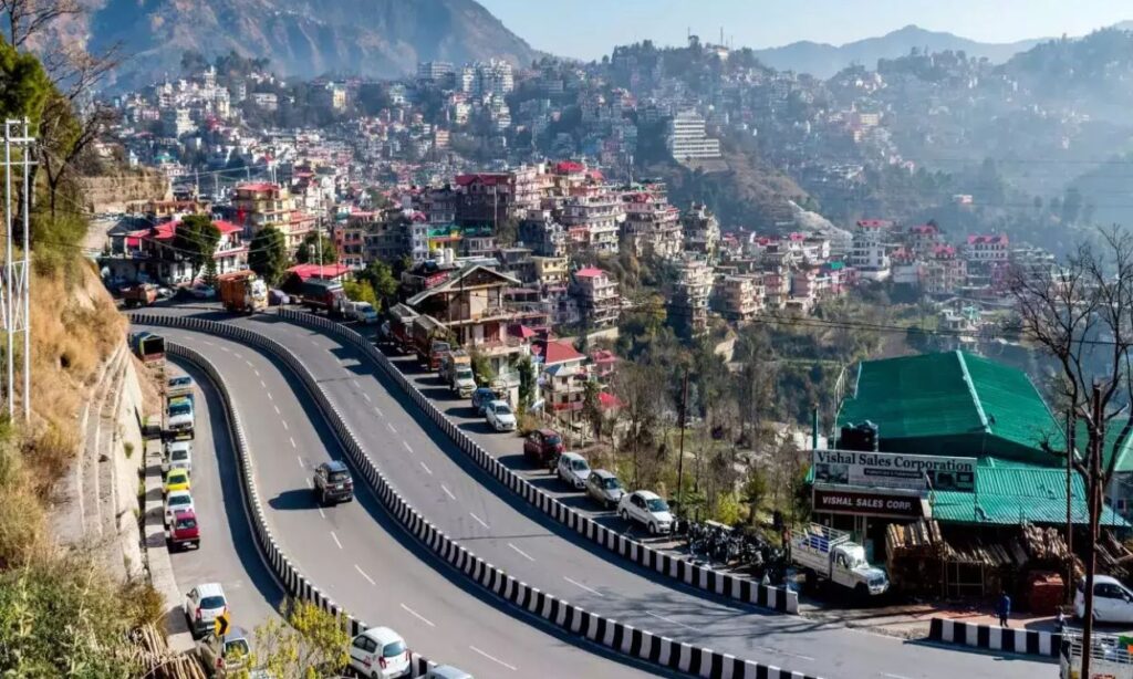 Quiet hill station near Delhi with green hills and mist